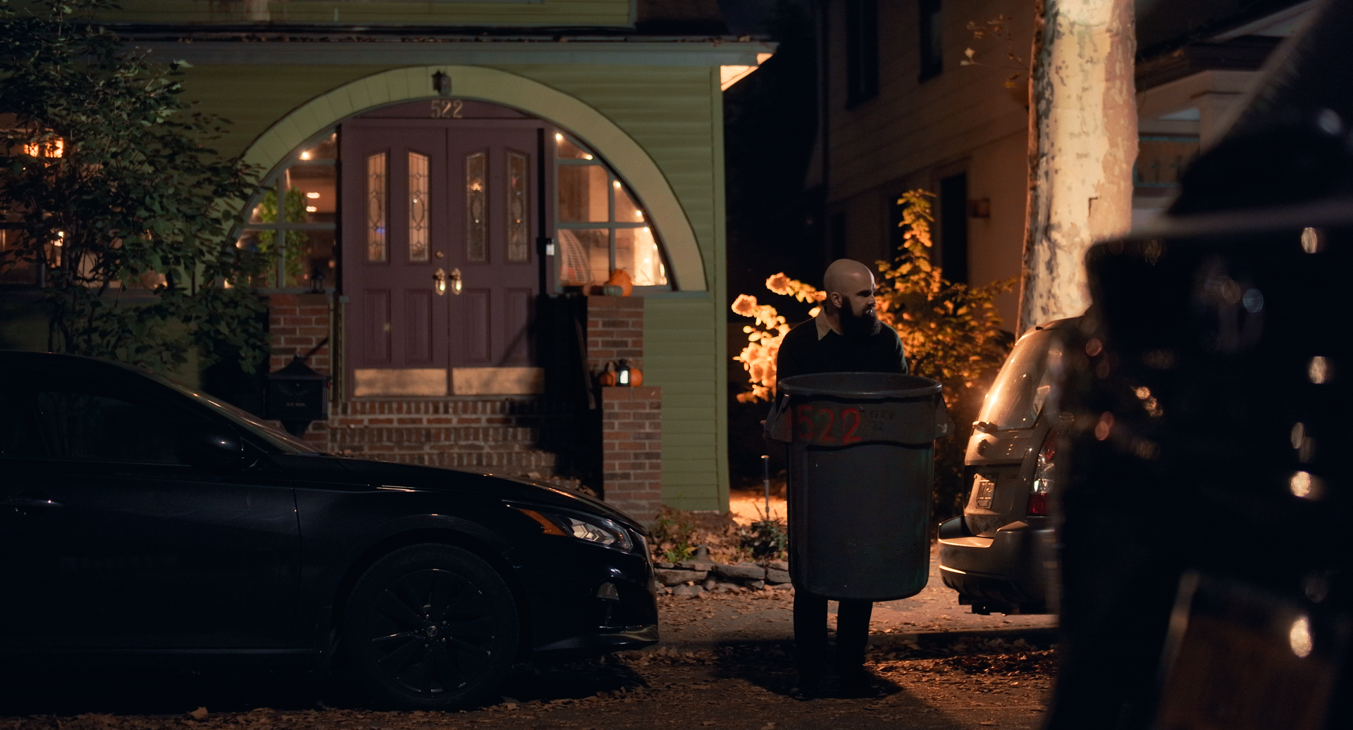 Waiting with trash can